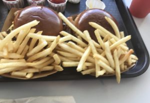 Bacon Cheeseburger and french fries at Walt Disney World's Cosmic Ray's in Magic Kingdom